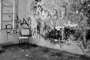 Image showing chair in decayed room