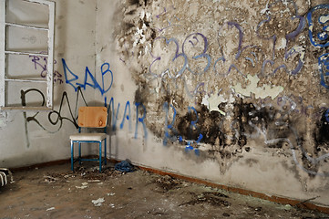 Image showing chair in decayed room