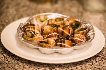 Image showing Close up of Escargots with garlic butter