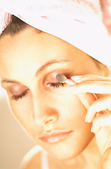 Image showing Girl doing makeup