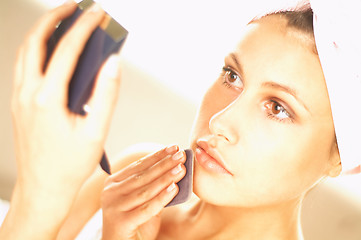 Image showing Girl doing makeup