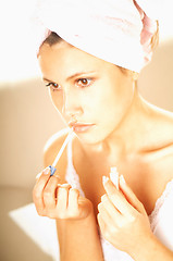 Image showing Girl doing makeup