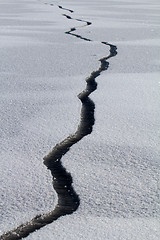Image showing spring crack in ice