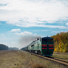 Image showing old train and smoke over it