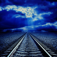 Image showing railroad in night to cloudy horizon