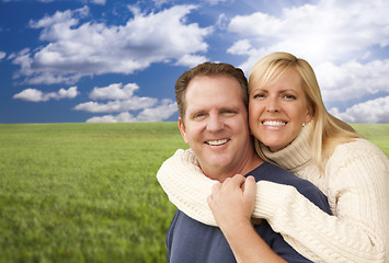 Image showing Happy Attractive Couple Hugging at the Park
