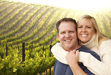 Image showing Happy Affectionate Couple at Beautiful Wine Vineyard