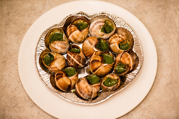 Image showing Close up of Escargots with garlic butter