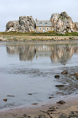 Image showing house between rock formation