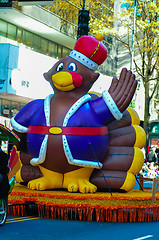 Image showing infalable thanksgiving turkey waving to crowd at a thanksgiving 