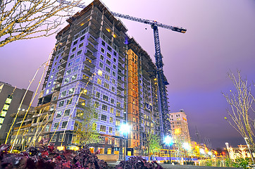 Image showing tall highrise building under construction in a big city