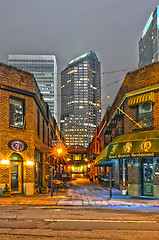 Image showing charlotte, nc  - December 8, 2013: Night view of a narrow alley 