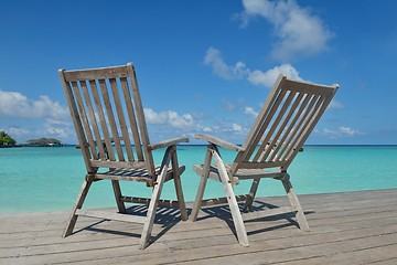 Image showing tropical beach chairs