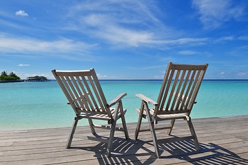 Image showing tropical beach chairs