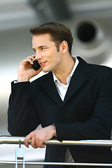 Image showing man enjoying with cellphone l