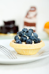 Image showing blueberry cream cupcake