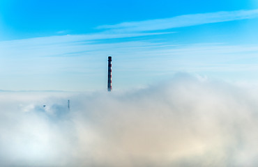 Image showing Factory chimneys and clouds of steam