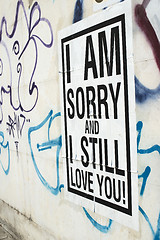 Image showing Text poster glued to the wall. I love You.