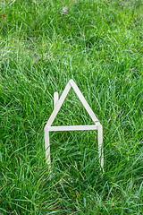 Image showing Model house made on green grass