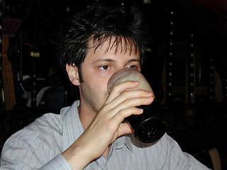 Image showing Man drinking a pint of beer