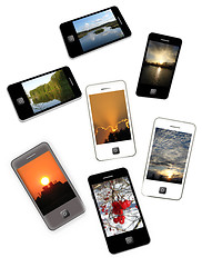 Image showing Modern mobile phones with different photo