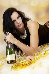 Image showing Beautiful young woman partying with champagne