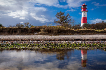 Image showing landscape baltic sea dunes lighthouse in red and white 