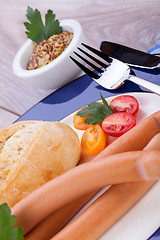 Image showing tasty sausages frankfurter with grain bread 