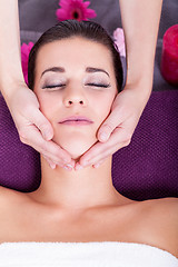 Image showing Woman having a relaxing facial massage