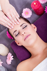 Image showing Woman having a relaxing facial massage