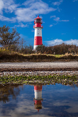 Image showing landscape baltic sea dunes lighthouse in red and white 