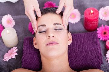 Image showing Woman having a relaxing facial massage