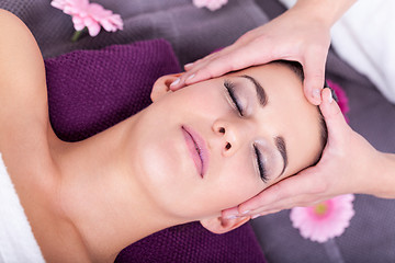 Image showing Woman having a relaxing facial massage