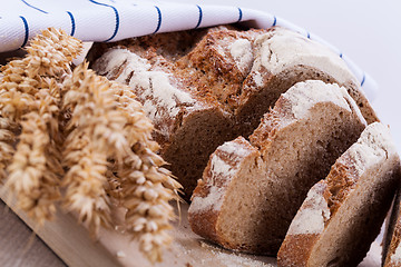 Image showing homemade fresh baked bread and knife 