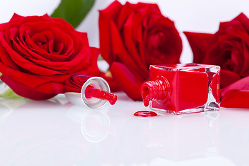 Image showing Elegant red nail varnish in a stylish bottle