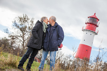 Image showing happy mature couple relaxing baltic sea dunes 