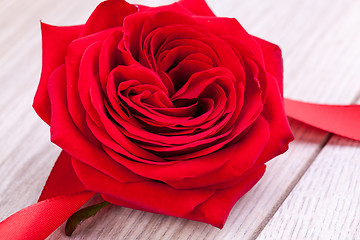 Image showing Bouquet of red roses with ribbon border