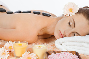 Image showing attractive healthy caucasian woman hot stone massage wellness 