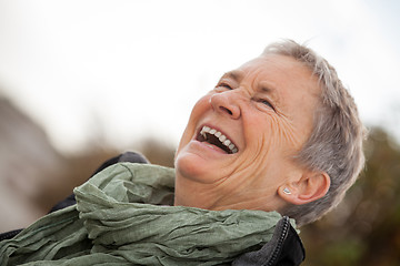 Image showing happy grey-haired elderly woman senior outdoor