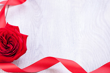 Image showing Bouquet of red roses with ribbon border