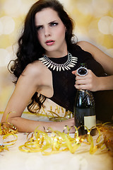 Image showing Beautiful young woman partying with champagne