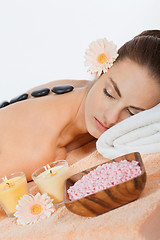 Image showing attractive healthy caucasian woman hot stone massage wellness 