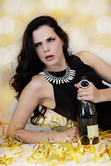 Image showing Beautiful young woman partying with champagne