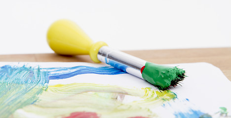 Image showing green paint with brush