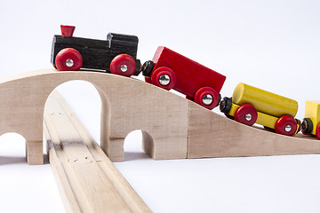 Image showing wooden toy train on bridge