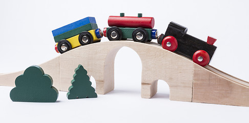 Image showing wooden toy train on bridge