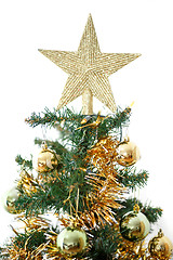 Image showing Decorated christmas tree with yellow and green balls 