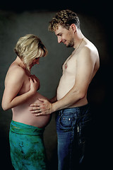 Image showing Loving happy couple, pregnant woman with her husband