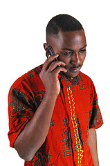 Image showing Black man on cell phone.