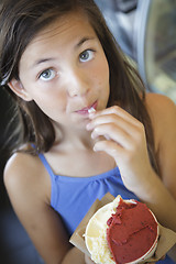 Image showing Pretty Young Girl Enjoying Her Gelato